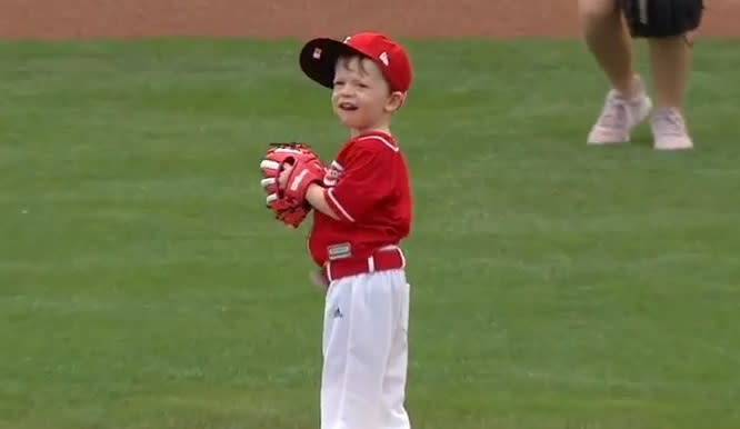 Nolan, a young Reds fan with spunk and determination, readies for his first pitch at Great American Ballpark. (MLB.TV)