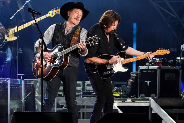 <p>Mary Kouw/CBS/Getty</p> Brooks & Dunn