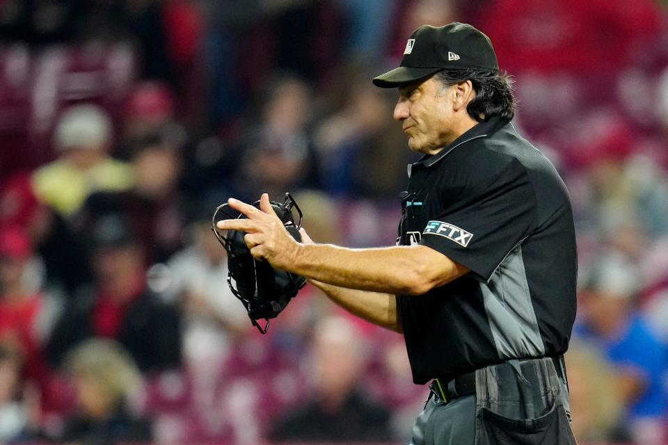 MLB plate umpires like Phil Cuzzi will continue to make balls and strikes calls this season, but in Triple A, ABS will relay calls to the umps.