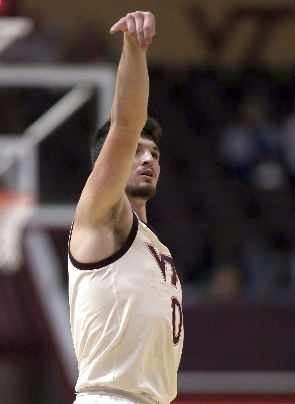 Virginia Tech's Hunter Cattoor (0) follows through on a 3-point basket against Campbell during the first half of an NCAA college basketball game Wednesday, Nov. 15, 2023, in Blacksburg, Va. (Matt Gentry/The Roanoke Times via AP)