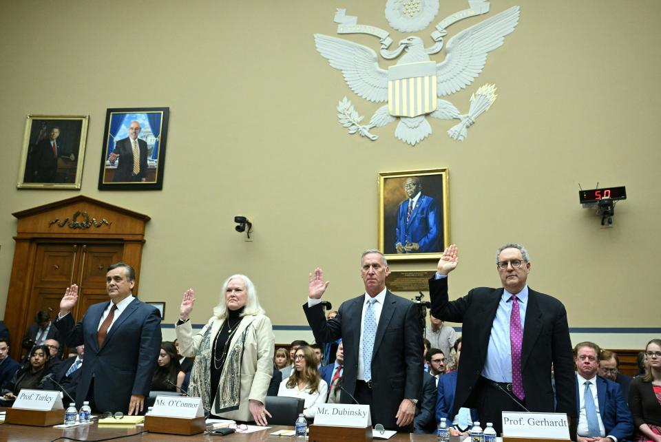 Witnesses are sworn in at the first formal hearing regarding the House impeachment inquiry into President Biden