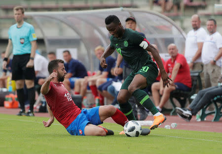 Soccer Football - International Friendly - Czech Republic vs Nigeria - Rudolf-Tonn-Stadion, Schwechat, Austria - June 6, 2018 Nigeria's John Obi Mikel in action with Czech Republic's Josef Husbauer REUTERS/Heinz-Peter Bader