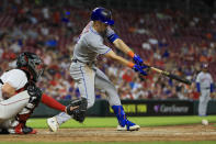 New York Mets' Mark Canha singles during the sixth inning of the team's baseball game against the Cincinnati Reds in Cincinnati, Tuesday, July 5, 2022. (AP Photo/Aaron Doster)