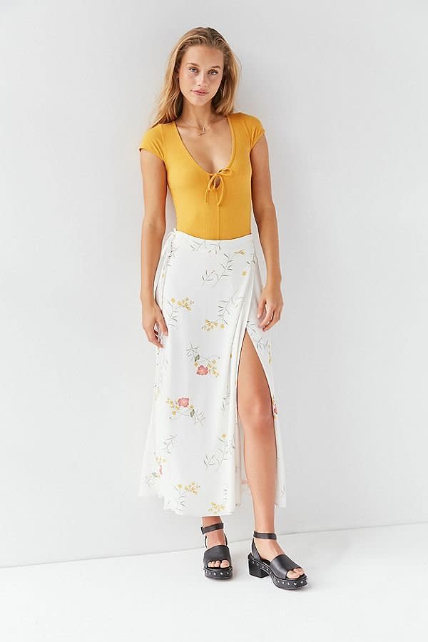 Get it at Urban <a href="https://www.urbanoutfitters.com/shop/capulet-thea-wrap-midi-skirt?category=SEARCHRESULTS&amp;color=015" target="_blank">Outfitters</a>, $138.