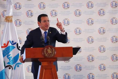 FILE PHOTO: Guatemala's President Jimmy Morales attends a meeting with mayors in Guatemala City, Guatemala, August 29, 2017. REUTERS/Luis Echeverria