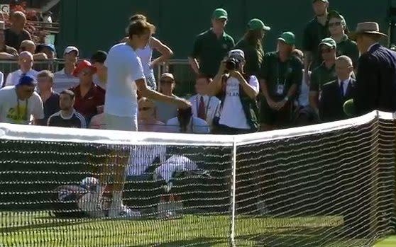 Medvedev throws coins at the umpire's feet - Credit: BBC