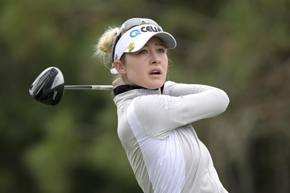 Nelly Korda tees off on the ninth hole during the final round of the Tournament of Champions LPGA golf tournament, Sunday, Jan. 23, 2022, in Orlando, Fla. (AP Photo/Phelan M. Ebenhack)