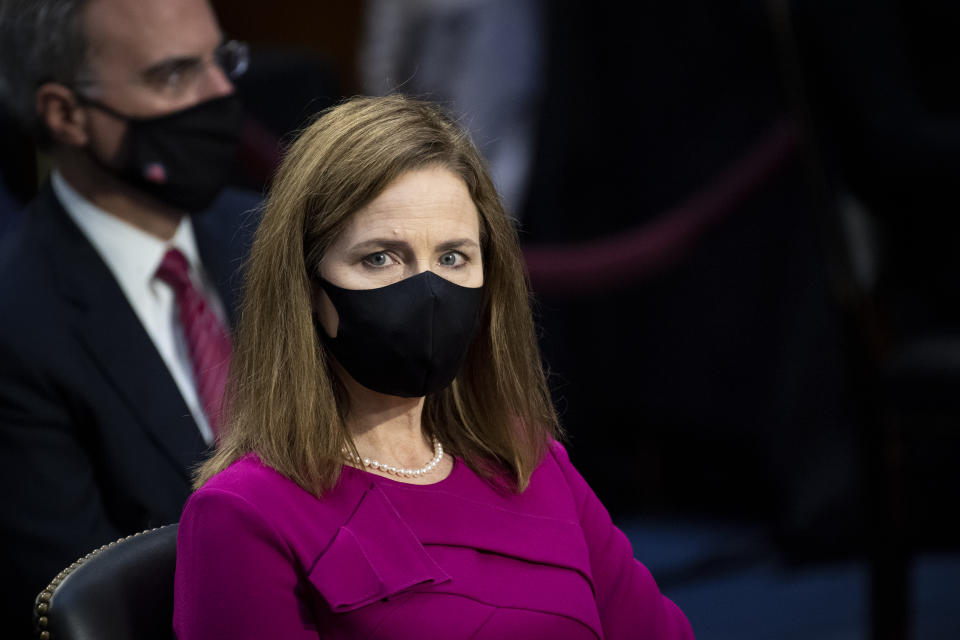 Supreme Court nominee Amy Coney Barrett listens during her Senate Judiciary Committee confirmation hearing on Capitol Hill in Washington, Monday, Oct. 12, 2020. (Caroline Brehman/Pool via AP)