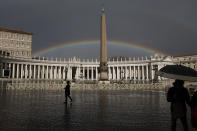 FILE - A rainbow shines over St.Peter's Square at the Vatican, on Jan. 31, 2021. In an interview with The Associated Press at The Vatican, Tuesday, Jan. 24, 2023, Pope Francis acknowledged that Catholic bishops in some parts of the world support laws that criminalize homosexuality or discriminate against the LGBTQ community, and he himself referred to homosexuality in terms of "sin." But he attributed attitudes to cultural backgrounds and said bishops in particular need to undergo a process of change to recognize the dignity of everyone. (AP Photo/Alessandra Tarantino, file)