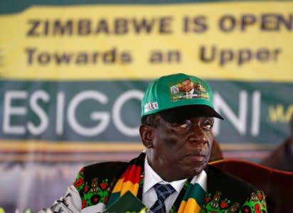 President Emmerson Mnangagwa arrives for the official opening of the ruling party ZANU PF's annual conference in Esigodini, outside Bulawayo, Zimbabwe December 14, 2018. REUTERS/Philimon Bulawayo