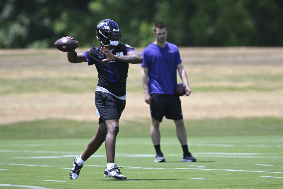 Baltimore Ravens quarterback Lamar Jackson throws during NFL football practice Tuesday, June 13, 2023, in Owings Mills, Md.(AP Photo/Gail Burton)