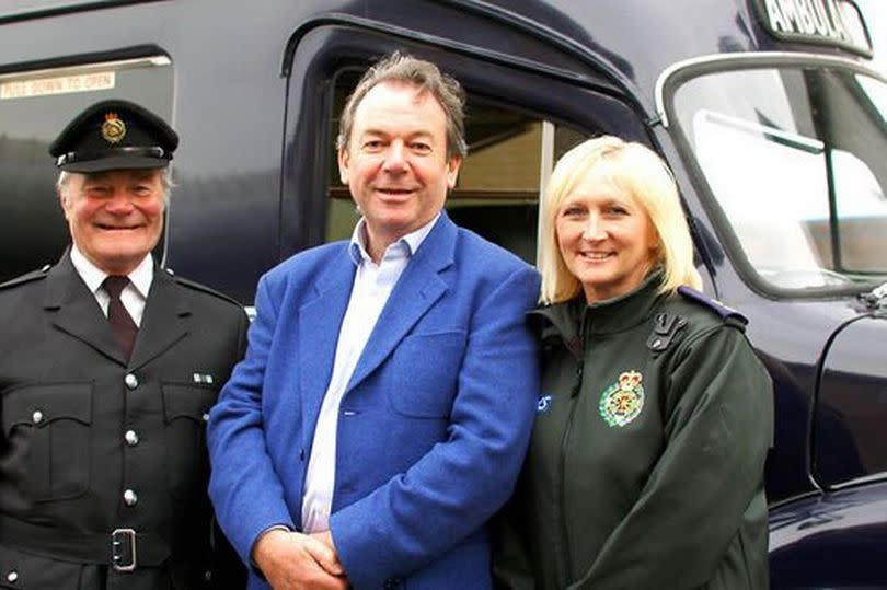 Eric poses with ambulance staff on the show