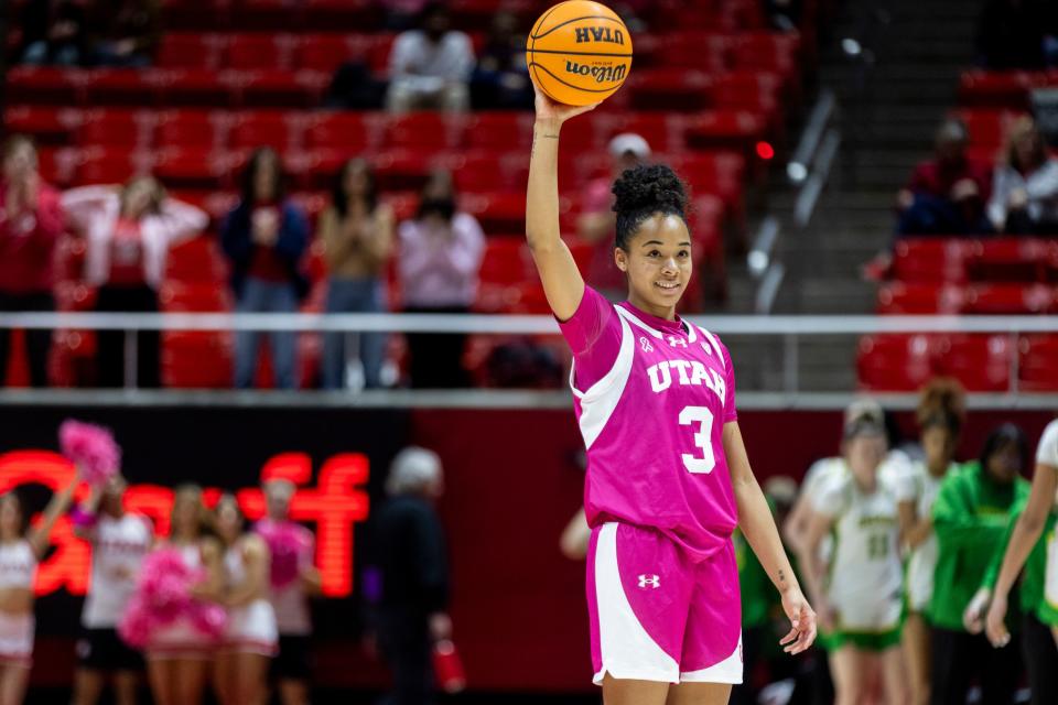 Utah Utes guard Lani White (3) holds up the ball after winning a game against the Oregon Ducks during a game at the Huntsman Center in Salt Lake City on Saturday, Feb. 11, 2023. The Utah Utes won 70-48. | Marielle Scott, Deseret News