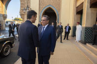 Morocco's Prime Minister Aziz Akhannouch welcomes Spanish Prime Minister Pedro Sanchez, left, in Rabat, Morocco, Thursday, Feb. 2, 2023. The prime ministers of Spain and Morocco held talks Thursday as part of wide-ranging meetings between the neighboring governments aimed at turning the page on diplomatic tensions and striking deals on customs crossings and business development. (AP Photo)