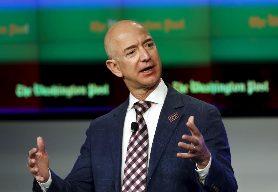 Jeff Bezos, owner of The Washington Post, delivers remarks at the grand opening of the Washington Post newsroom in Washington January 28, 2016.  REUTERS/Gary Cameron