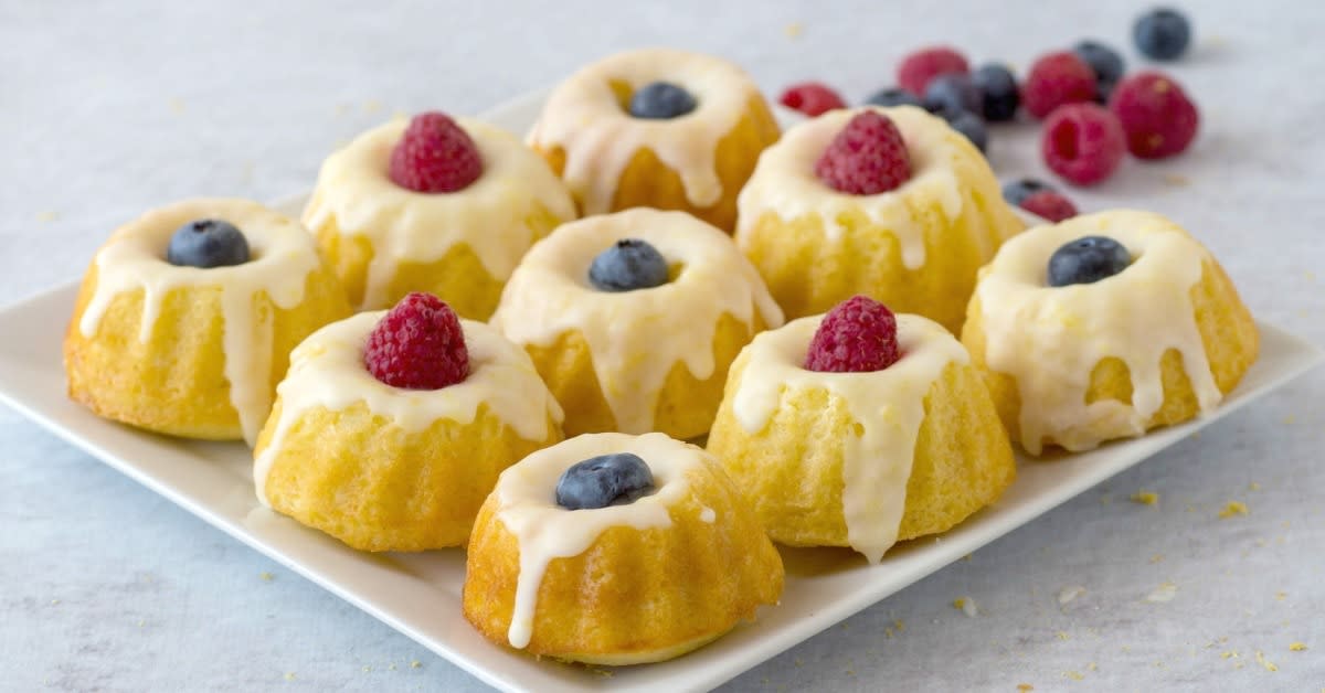 <p>Upstate Ramblings</p><p>Make these cute mini lemon bundt cakes for Mom! Top them off with glaze and fresh fruit for a delicious bite sized dessert.</p><p><strong>Get the recipe: <a href="https://www.upstateramblings.com/mini-lemon-bundt-cakes/" rel="nofollow noopener" target="_blank" data-ylk="slk:Mini Lemon Bundt Cakes;elm:context_link;itc:0;sec:content-canvas" class="link rapid-noclick-resp">Mini Lemon Bundt Cakes</a></strong></p>