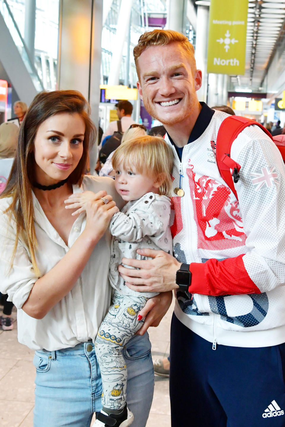 <p>Great Britain’s Greg Rutherford poses for a photograph with his partner, Susie Verrill, and son Milo. </p>