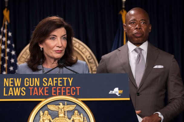 PHOTO: New York Gov. Kathy Hochul, left, and New York City Mayor Eric Adams, right, attend a news conference about upcoming 'Gun Free Zone' implementation at Times Square, Wednesday, Aug. 31, 2022, in New York. (Yuki Iwamura/AP)