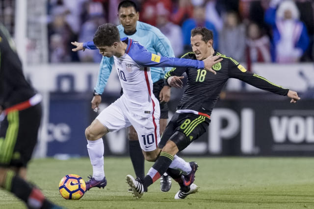 Mexican soccer star Luis Hernandez heads a ball during a training