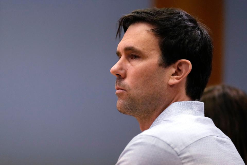 James Parker listens to the parole boards decision during his parole hearing, Thursday, April 18, 2024, in Concord, N.H. Parker who served more than half of his life in prison for his role in the 2001 stabbing deaths of two married Dartmouth College professors as part of a plan to rob and kill people before fleeing overseas has been granted parole. (AP Photo/Charles Krupa)