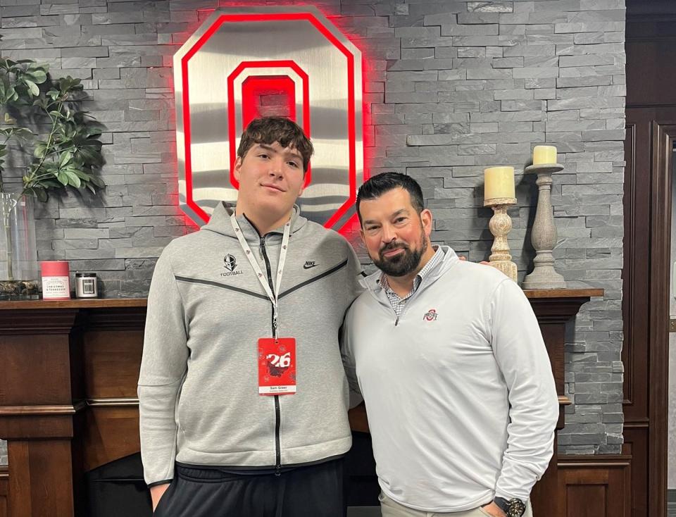 It didn't take long for Hoban offensive lineman Sam Greer, left, to make a name in the recruiting ranks. Ohio State coach Ryan Day and the Buckeyes have already offered the budding talent.