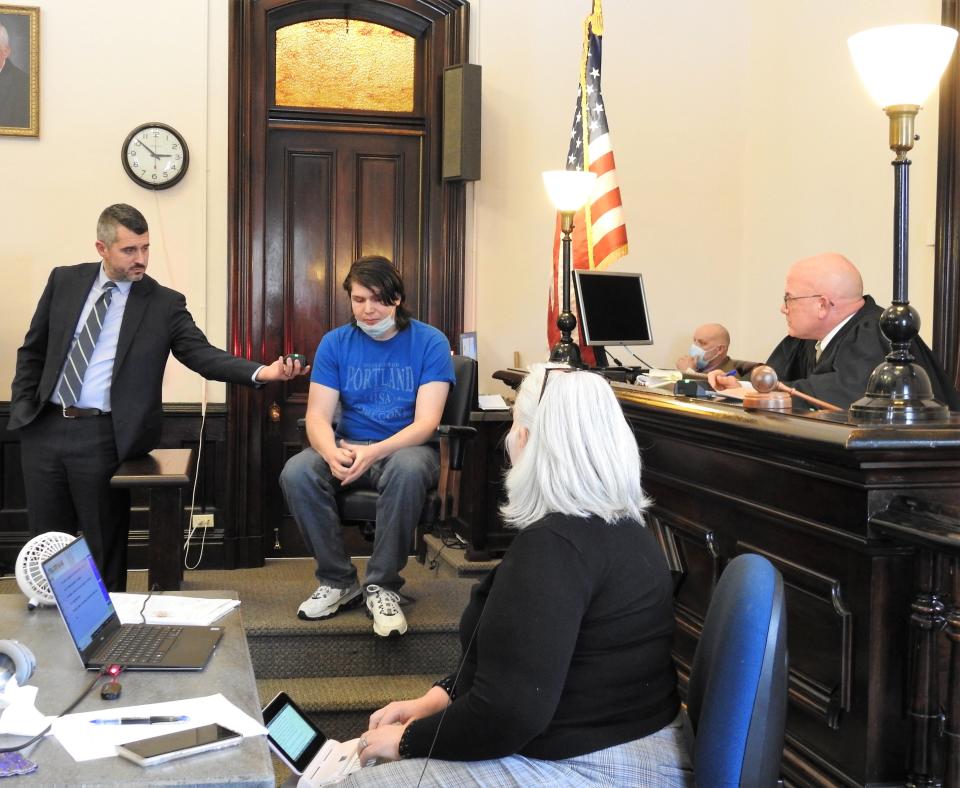 Dylan Ratliff speaks about the loss of his sister, Brianna Ratliff, Wednesday in Coshocton County Common Pleas Court while Prosecutor Jason Given, Judge Robert Batchelor and Court Reporter Lynn Els look on. Blake Grewell was sentenced to life in prison without the possible of parole for Brianna's murder.