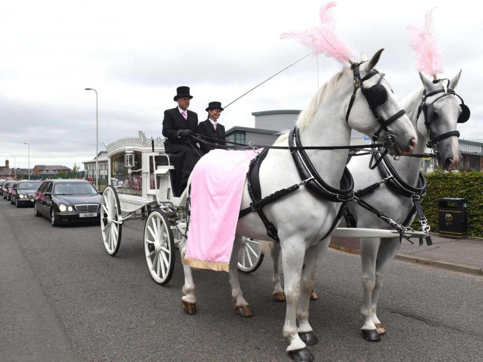 Funeral cortege arrives at the Coats Funeral Home, in Coatbridge, Scotland, prior to the funeral of six-year-old Alesha MacPhail, whose body was found on the Isle of Bute earlier this month (Lesley Martin/PA Wire)