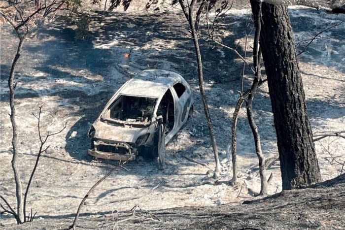 The man arrested Thursday is suspected of driving the burning car above into a park and starting the blaze, authorities said; (photo/Butte County District Attorney's Office)