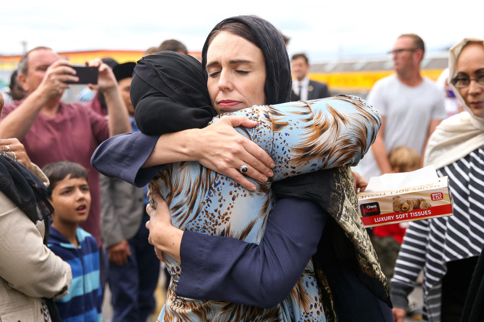 Prime Minister Jacinda Ardern hugs a woman at the Kilbirnie Mosque on March 17, 2019 in Wellington, New Zealand. (Photo by Hagen Hopkins/Getty Images)