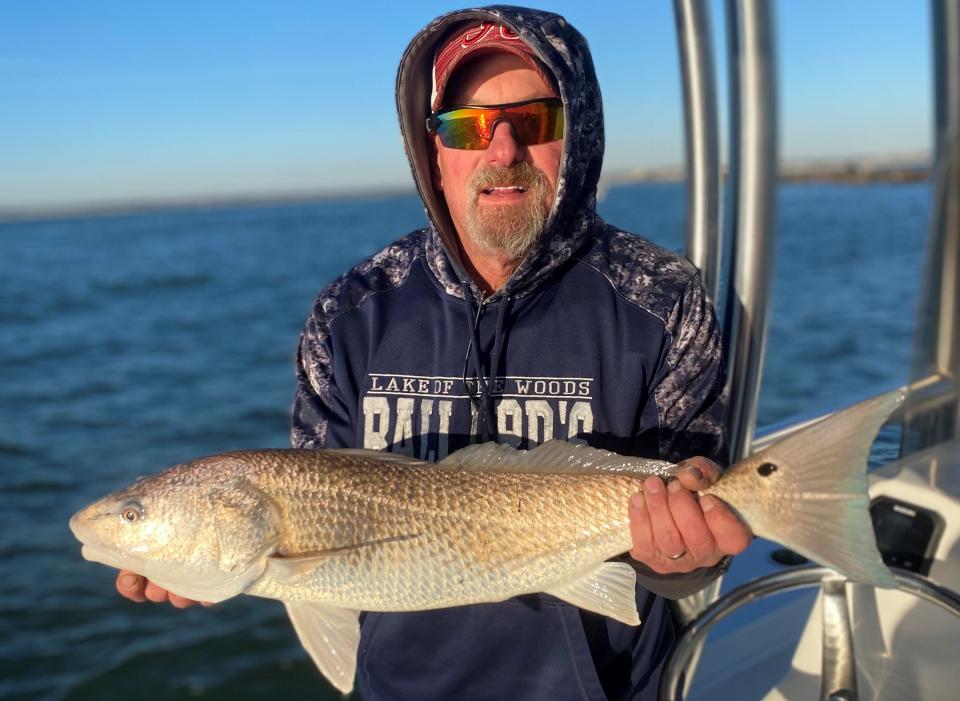 Tim Davidson, visiting from Colorado Springs, caught and released this over-slot red while fishing aboard Capt. Jeff Patterson's Pole Dancer charter boat.