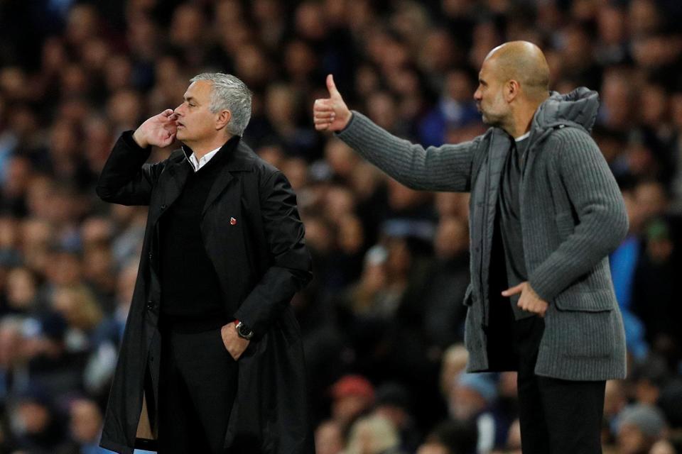 City divide: Mourinho and Guardiola are separated by much more than 12 points: REUTERS