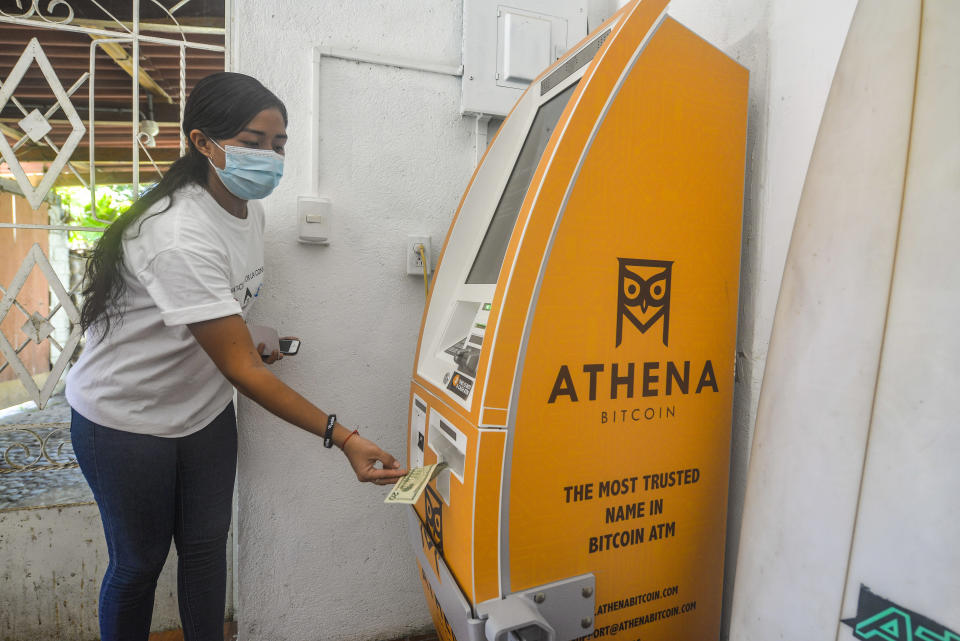 CHILTUIPAN, LA LIBERTAD, EL SALVADOR - 2021/06/07: A woman withdraws money from an Athena Bitcoin ATM.
Salvadoran President Nayib Bukele has announced that he will propose a law to the Congress, where his party controls a majority, for Bitcoin to become legal tender. El Salvador would become the first country in the world to accept a cryptocurrency as a legal tender. (Photo by Camilo Freedman/SOPA Images/LightRocket via Getty Images)