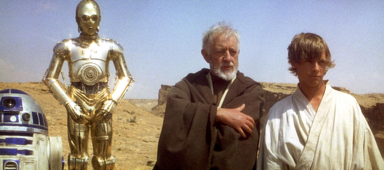 British actors Anthony Daniels, Alec Guinness and American Mark Hamill on the set of Star Wars: Episode IV - A New Hope written, directed and produced by Georges Lucas. (Photo by Sunset Boulevard/Corbis via Getty Images)