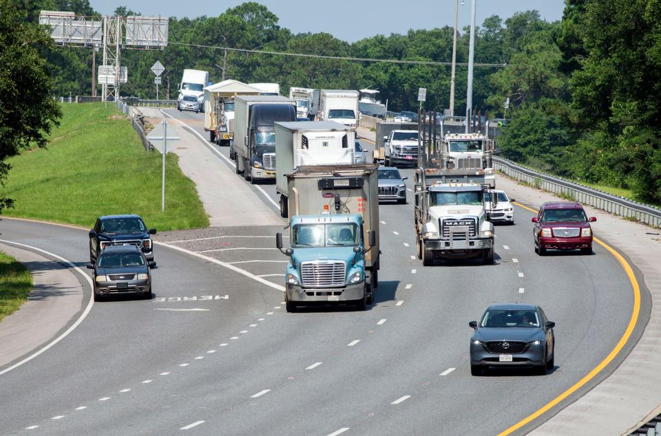Motorists navigate the heavily congested eastbound corridor of Interstate 10 near the Highway 29 interchange on Friday, June 30, 2023. The Florida Department of Transportation is preparing to reconstruct the interchange to improve traffic flow. 
