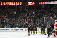 Anaheim Ducks right wing Jakob Silfverberg (33) waves to people in the stands during the first period of the team's NHL hockey game against the Calgary Flames, Friday, April 12, 2024, in Anaheim, Calif. Silfverberg announced that he plans to retire after the season. (AP Photo/Kyusung Gong)