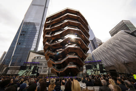 A large public art sculpture called 'The Vessel,' made up of 155 flights of stairs, is seen during the grand opening of the The Hudson Yards development, a residential, commercial, and retail space on Manhattan's West side in New York City, New York, U.S., March 15, 2019. REUTERS/Brendan McDermid