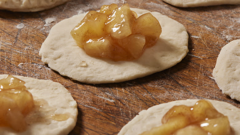 biscuit dough topped with fruit filling