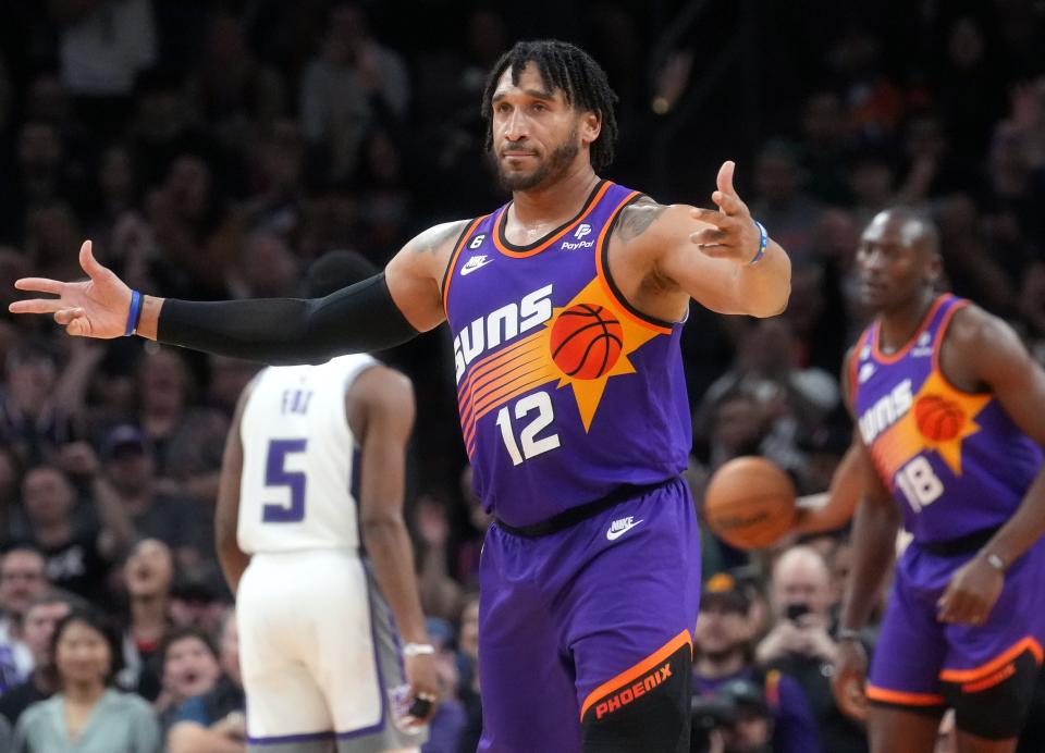 Phoenix Suns forward Ish Wainright (12) celebrates his 3-pointer against the Sacramento Kings at Footprint Center in Phoenix on March 11, 2023.
