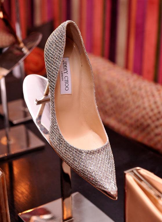 A Jimmy Choo shoe is displayed at Saks Fifth Avenue on September 21, 2012 in New York City