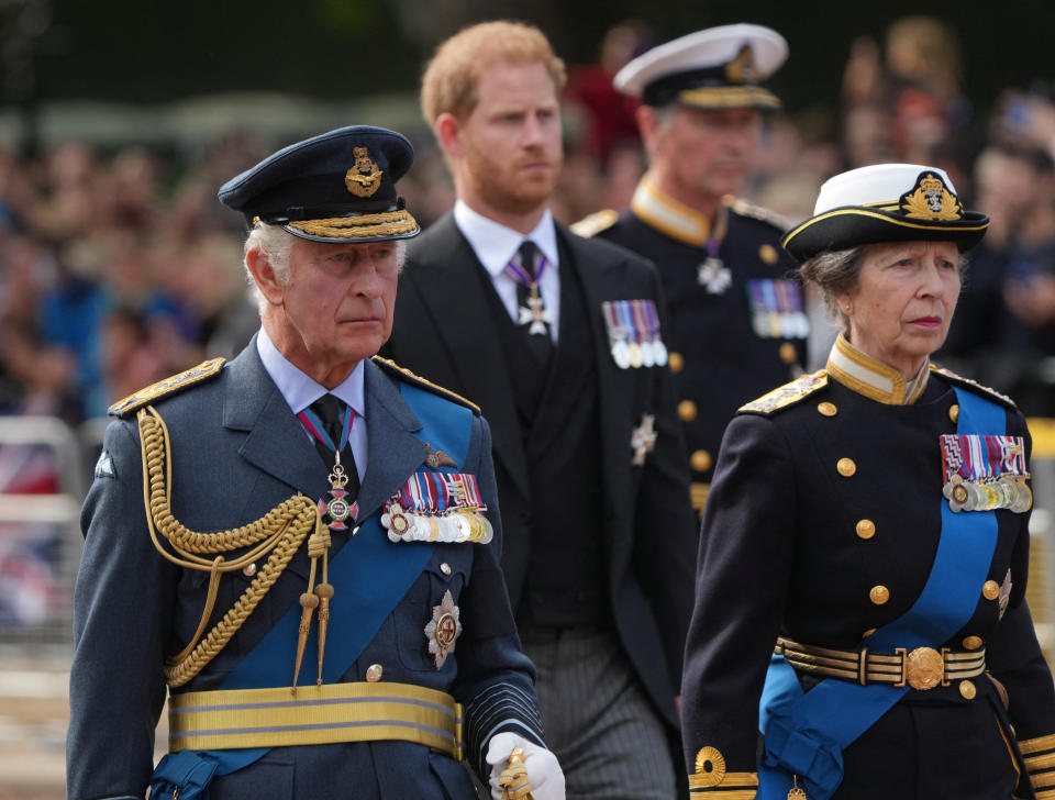 <p>Britain's King Charles, Princess Anne, and Prince Harry march during the procession of the coffin of Britain's Queen Elizabeth from Buckingham Palace to the Houses of Parliament for her lying in state, in London, Britain, September 14, 2022. REUTERS/Maja Smiejkowska</p> 