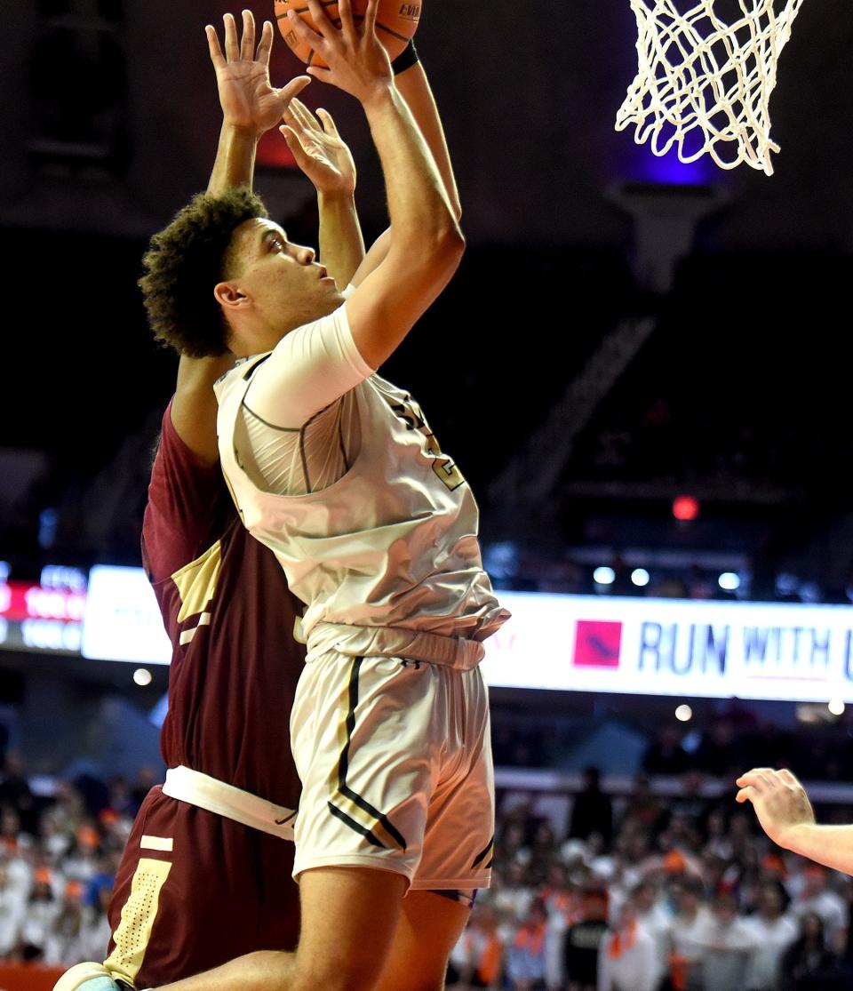 Sacred Heart-Griffin's Zack Hawkinson goes up for a basket in the Class 3A boys basketball semifinal against Chicago St. Ignatius on Friday, March 11, 2022, at State Farm Center in Champaign.