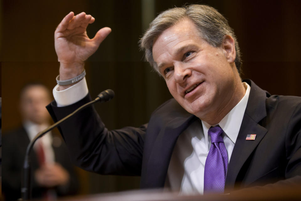 FILE - In this May 7, 2019, file photo, FBI Director Christopher Wray testifies during a hearing on Capitol Hill in Washington. Wray is set to appear before a Senate committee examining oversight of the bureau. The July 23 hearing could be something of a preview of the intense questioning special counsel Robert Mueller is likely to face when he appears before Congress the next day. (AP Photo/Alex Brandon, File)