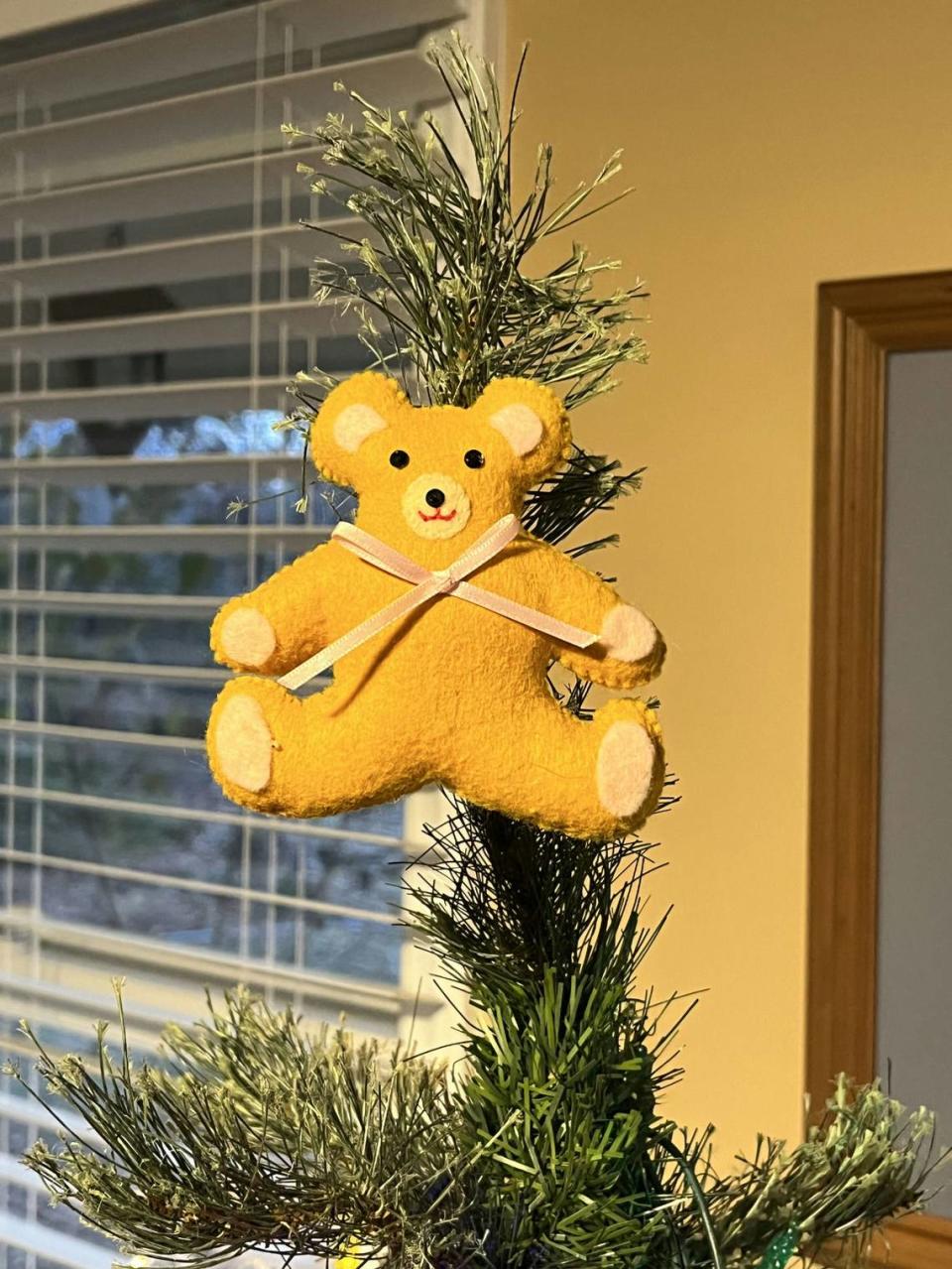 Stacie Hagwood received this bear as a gift from an acquaintance early in her job as a Raleigh police officer. The lady who made it gave them to others, too, and Hagwood later spotted one on the tree of the woman who would eventually become her mother-in-law. It seemed a fateful connection.