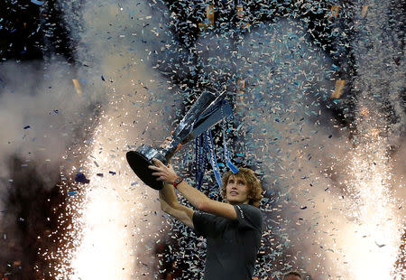 Tennis - ATP Finals - The O2, London, Britain - November 18, 2018 Germany's Alexander Zverev celebrates with the trophy after winning the final against Serbia's Novak Djokovic Action Images via Reuters/Andrew Couldridge