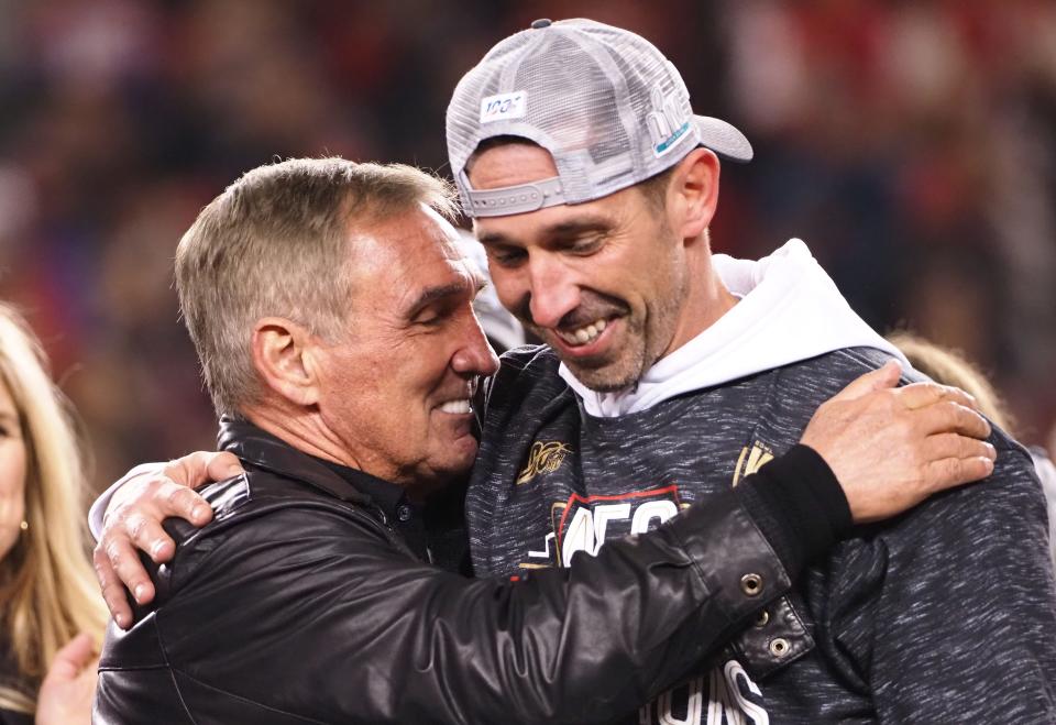 San Francisco 49ers head coach Kyle Shanahan celebrates a 37-20 victory against the Green Bay Packers with his father, Mike Shanahan, in the NFC Championship Game at Levi's Stadium. Mike Shanahan was a three-time Super Bowl champion as a coach. (Kelley L Cox-USA TODAY Sports)