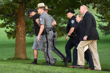 Nauman Hussain (L), the operator of a limousine company that owned the vehicle involved in a crash that killed 20 people in upstate New York arrives for his arraignment at Cobleskill Town Court in Cobleskill, New York, U.S., October 10, 2018. REUTERS/Cindy Schultz