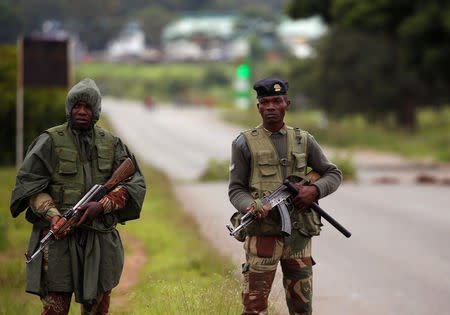 Soldiers patrol during protests on a road leading to Harare, Zimbabwe, during protests, January 15, 2019. REUTERS/Philimon Bulawayo