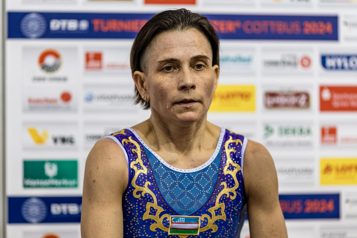 24 February 2024, Brandenburg, Cottbus: Gymnastics: World Cup, women: Vault, final in the Lausitz Arena. Oksana Chusovitina from Uzbekistan reacts after her routine. Photo: Frank Hammerschmidt/dpa (Photo by Frank Hammerschmidt/picture alliance via Getty Images)