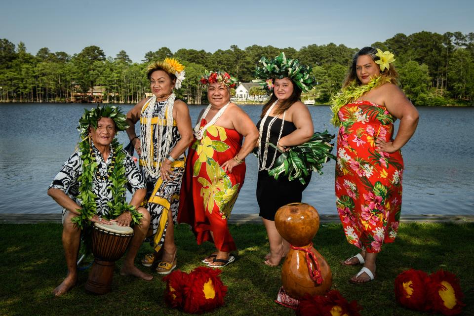 Left to right: Sonny Guerrero, Cecille Guerrero, Kuinanialoha Rivera, Jasmarie Barbadillo and Lahela Barbadillo pose for photos in Hawaiian dress.