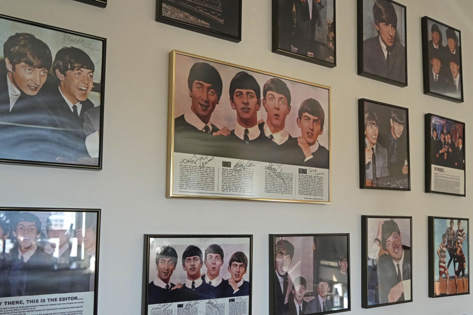 FILE - The copies of his Beatles' autographs are framed and displayed as the originals are kept with the lawyer, at Ray Cordeiro's home in Hong Kong, Thursday, May 27, 2021. Cordeiro, who interviewed music acts including the Beatles during a six-decade career on Hong Kong radio that earned him the title of the world's longest-working disc jockey, died Friday, Jan. 13, 2023, his former employer announced. He was 98. (AP Photo/Kin Cheung, File)